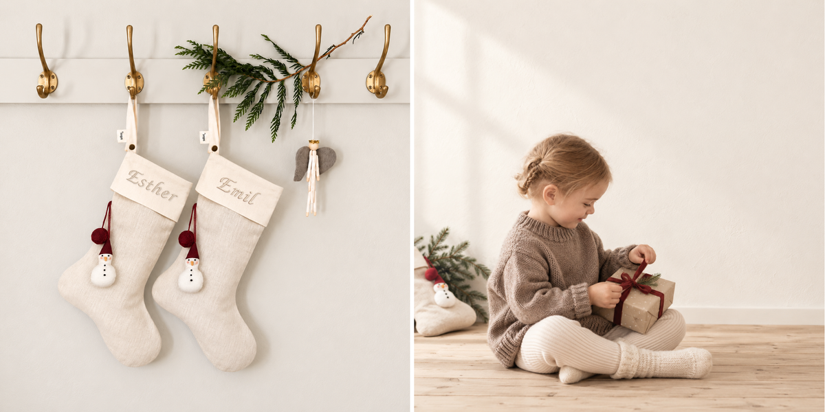 Personalised Christmas stockings embroidered Esther and Emil, and a little girl opening a Christmas gift